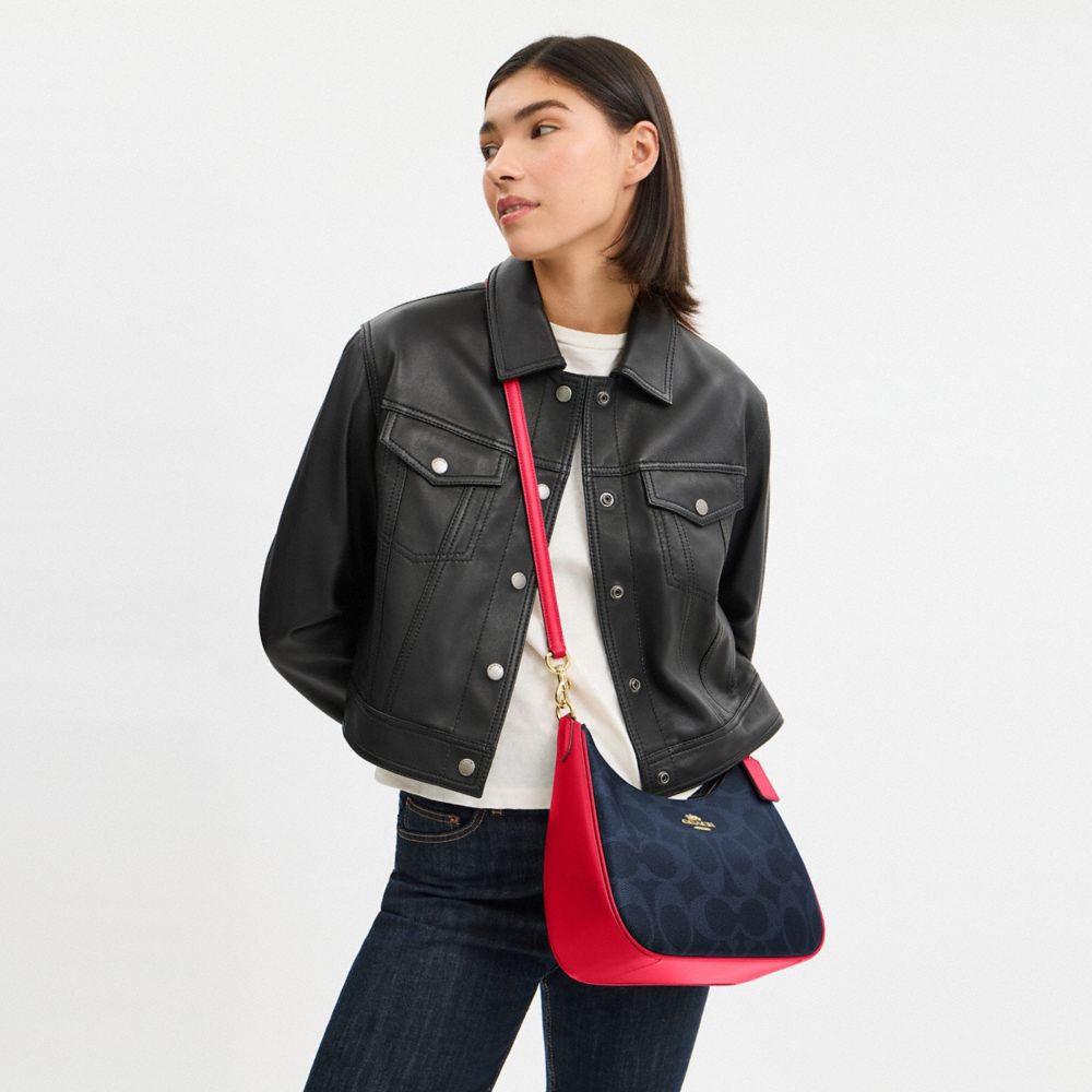 Teri Hobo Bag In Signature Canvas