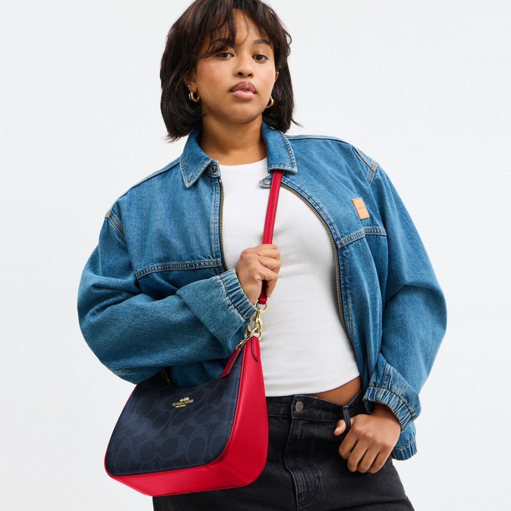 Teri Hobo Bag In Signature Canvas