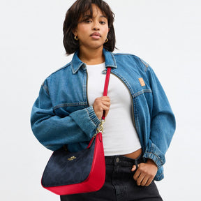 Teri Hobo Bag In Signature Canvas