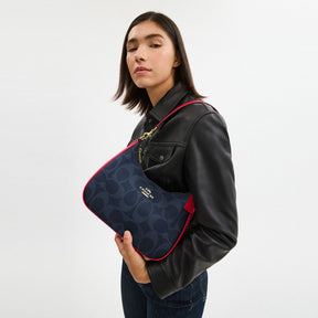Teri Hobo Bag In Signature Canvas