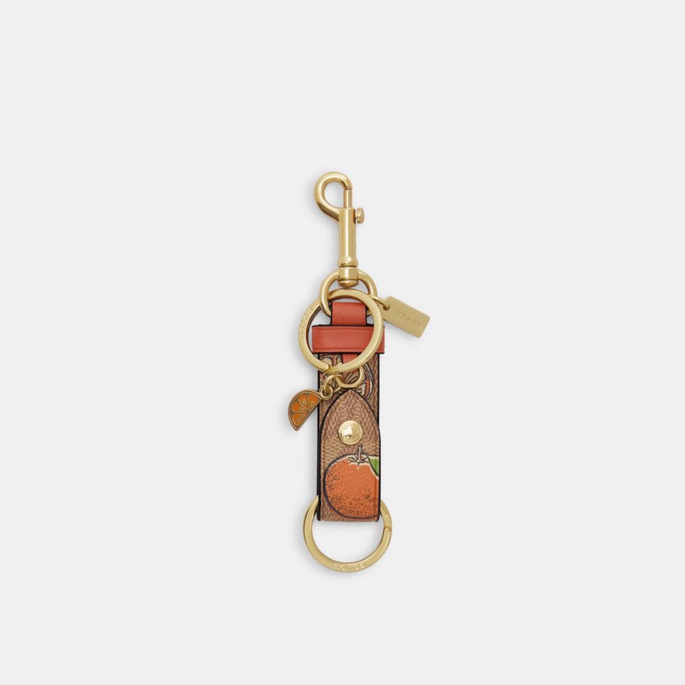 Trigger Snap Bag Charm In Signature Canvas With Orange Print