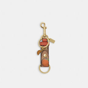 Trigger Snap Bag Charm In Signature Canvas With Orange Print