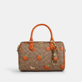 Trigger Snap Bag Charm In Signature Canvas With Orange Print