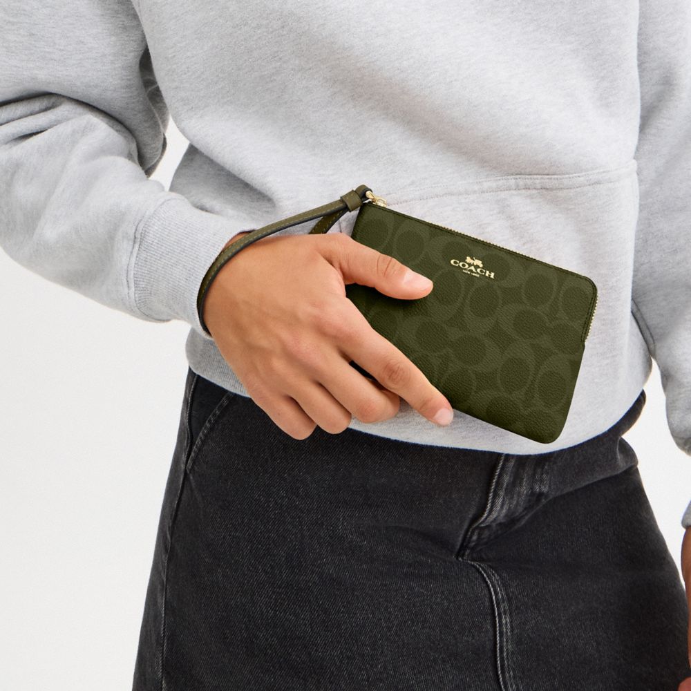 Corner Zip Wristlet In Signature Canvas