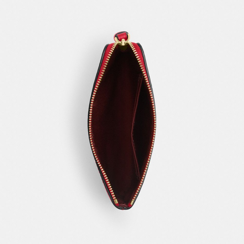 Corner Zip Wristlet In Signature Canvas