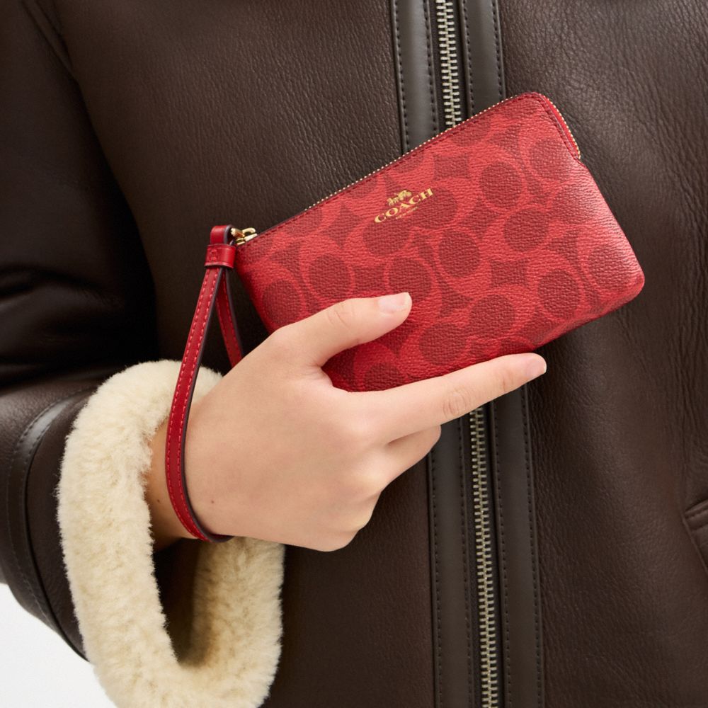 Corner Zip Wristlet In Signature Canvas