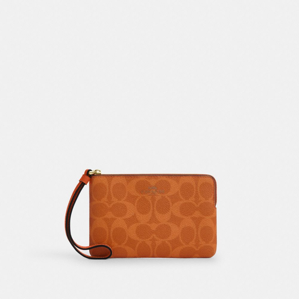 Corner Zip Wristlet In Signature Canvas