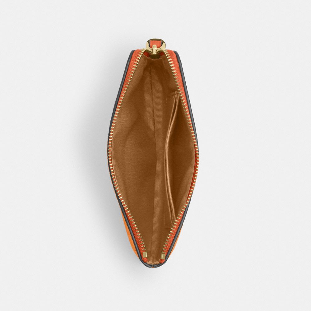 Corner Zip Wristlet In Signature Canvas