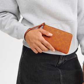 Corner Zip Wristlet In Signature Canvas