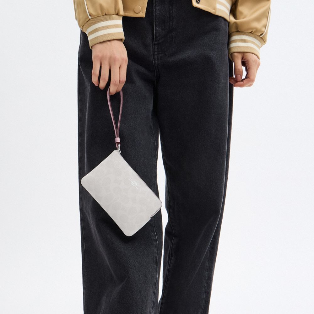 Corner Zip Wristlet In Signature Canvas