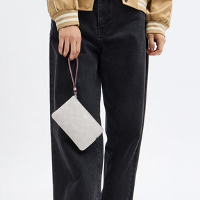 Corner Zip Wristlet In Signature Canvas