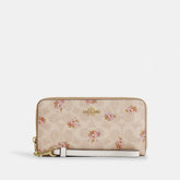 Long Zip Around Wallet In Signature Canvas With Floral Print