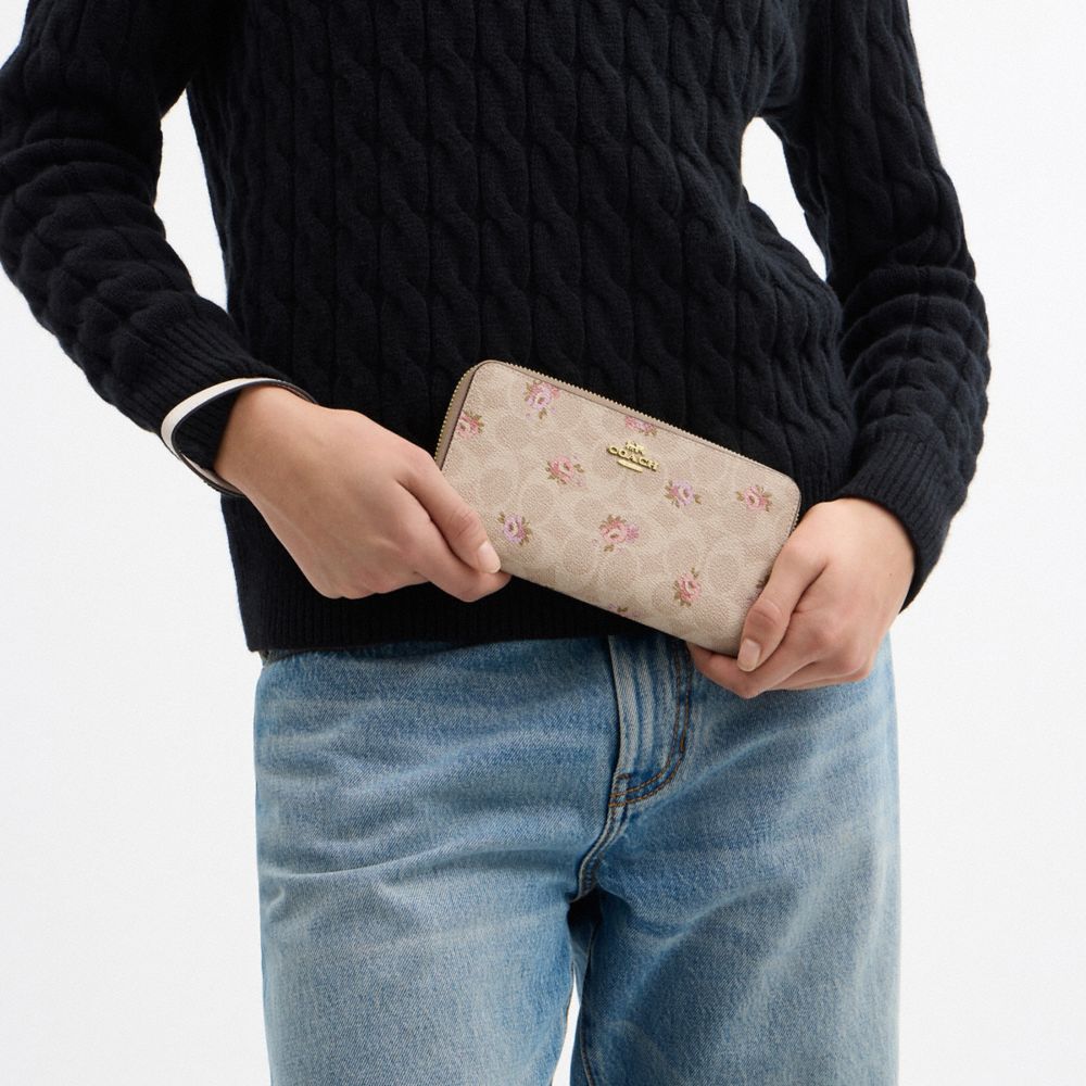 Long Zip Around Wallet In Signature Canvas With Floral Print