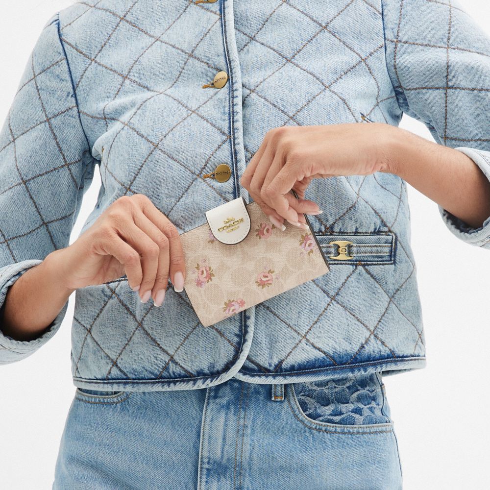 Medium Corner Zip Wallet In Signature Canvas With Floral Print