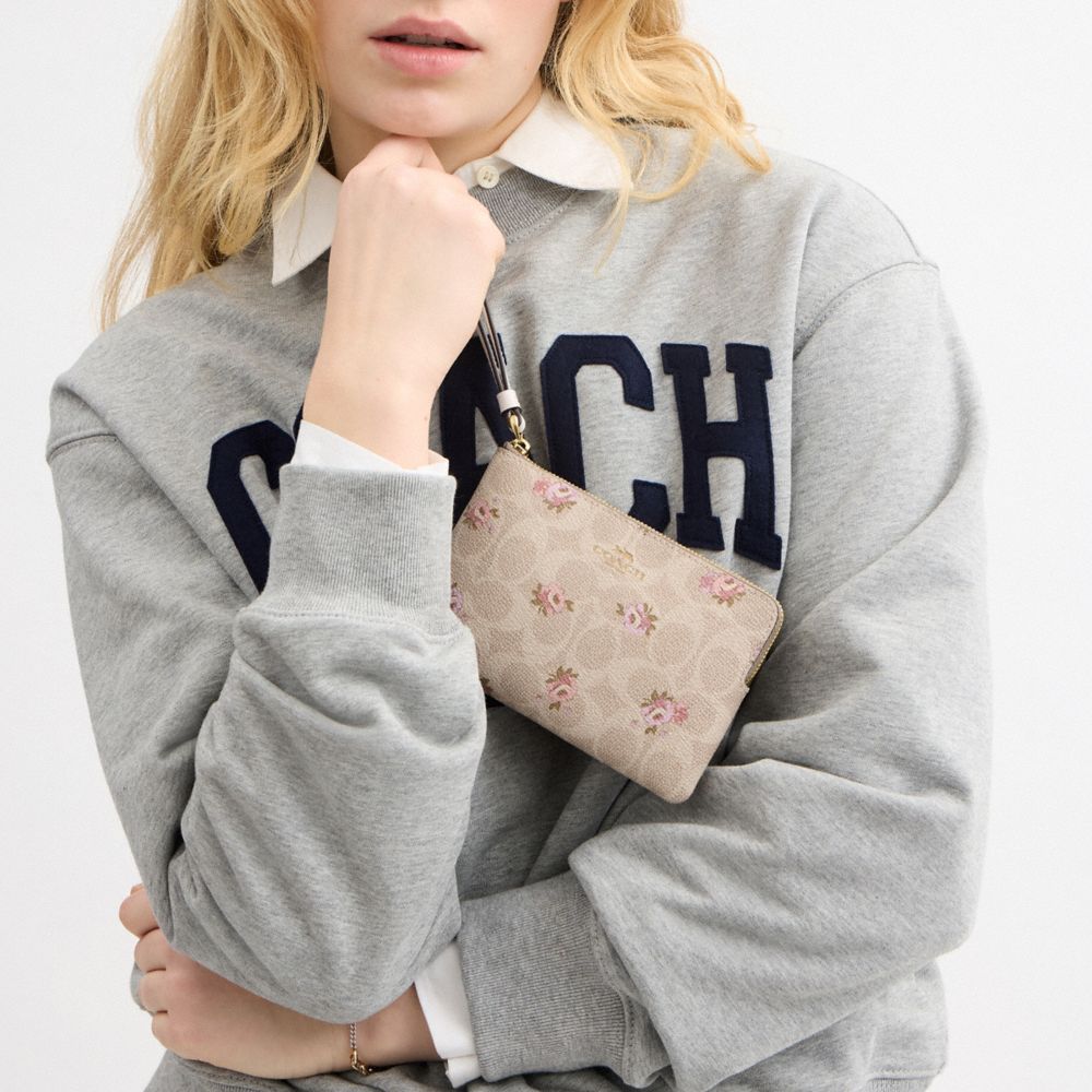 Corner Zip Wristlet In Signature Canvas With Floral Print