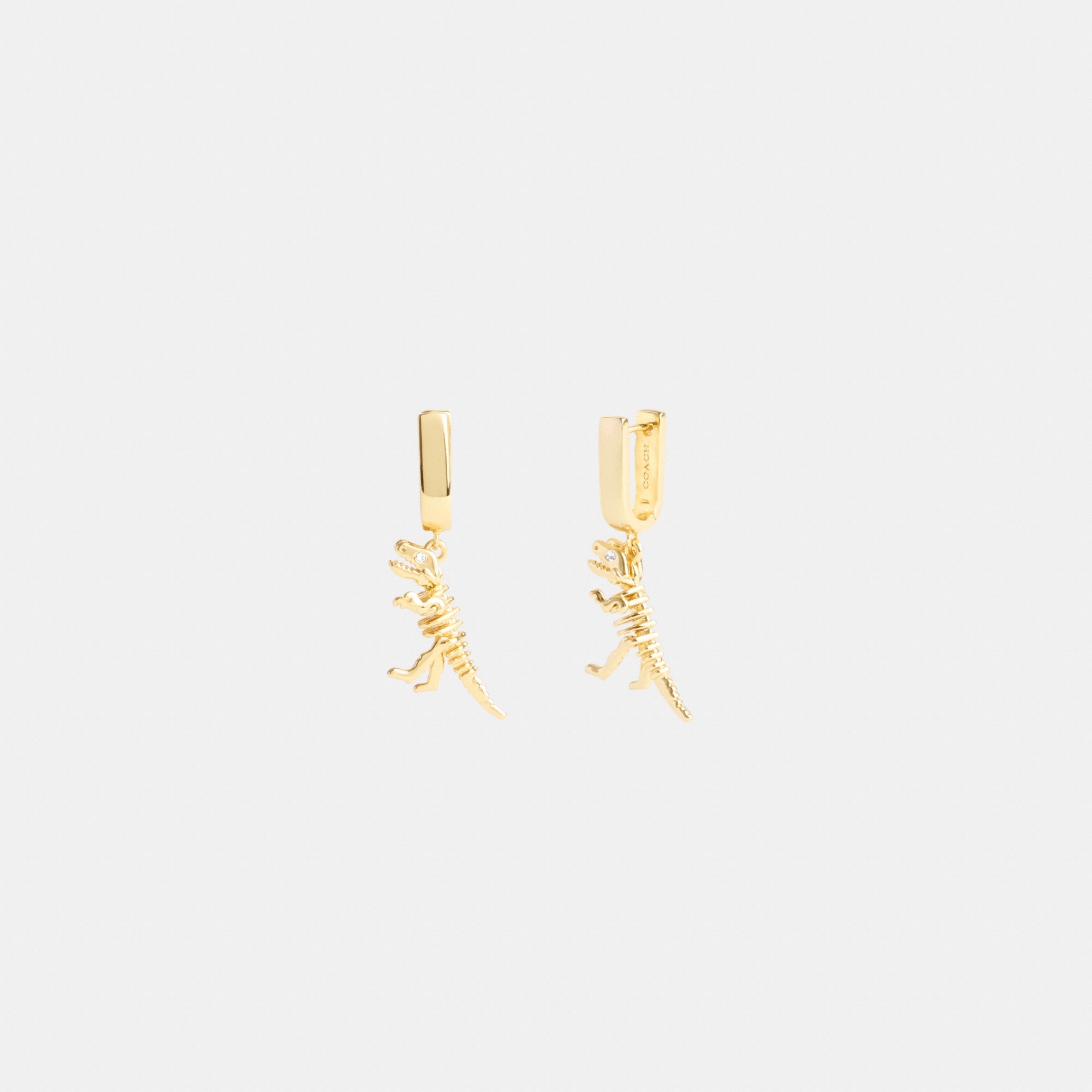 Skeletal Rexy Huggie Earrings