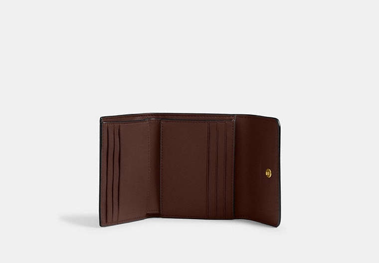 Mila Small Flap Wallet In Signature Canvas