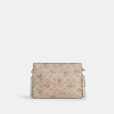 Slim Crossbody Bag In Signature Canvas With Floral Print