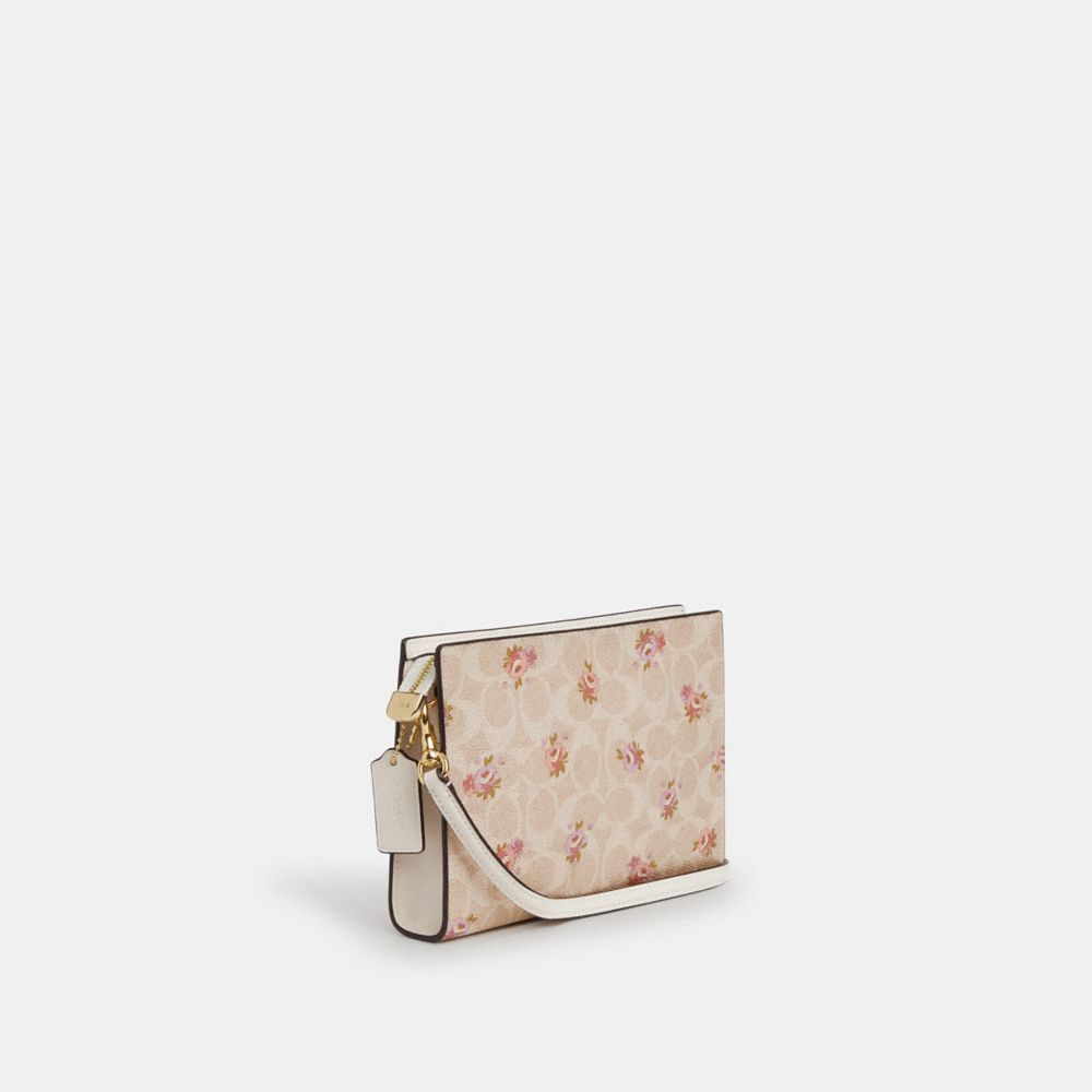 Slim Crossbody Bag In Signature Canvas With Floral Print