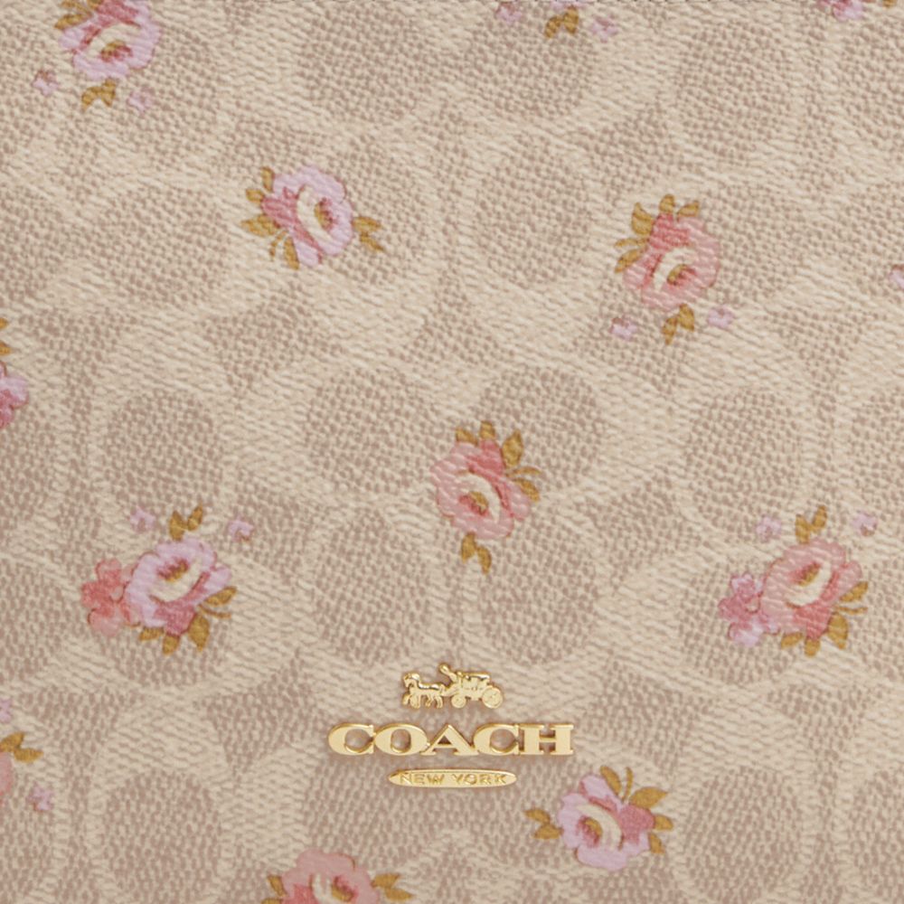 Slim Crossbody Bag In Signature Canvas With Floral Print