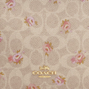 Slim Crossbody Bag In Signature Canvas With Floral Print