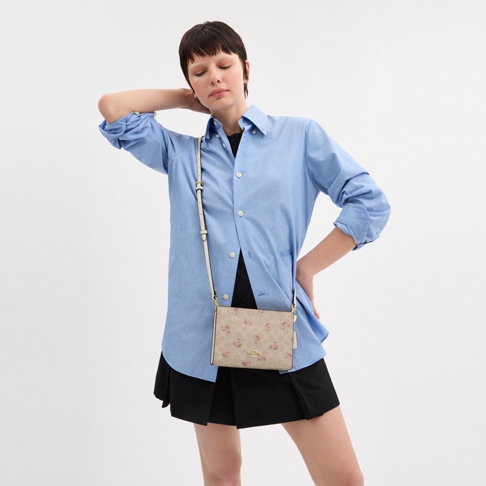 Slim Crossbody Bag In Signature Canvas With Floral Print