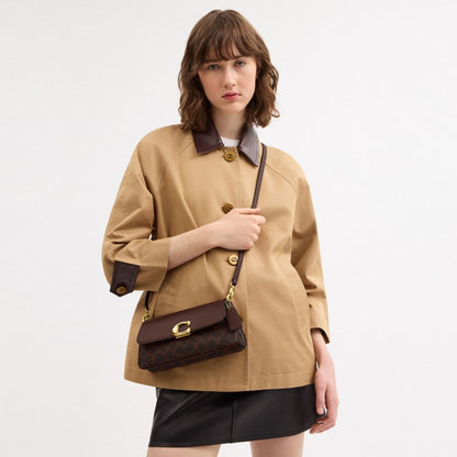 Jet Shoulder Bag In Signature Canvas