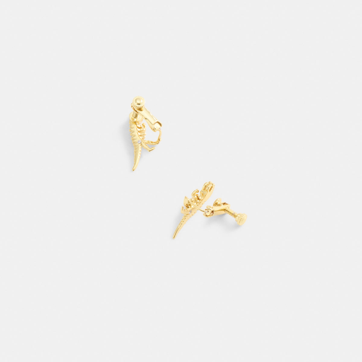 Skeletal Rexy Clip-On Stud Earrings