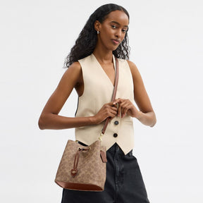 Rowan Bucket Bag In Signature Canvas