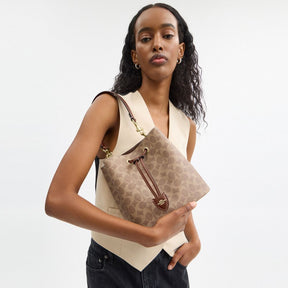 Rowan Bucket Bag In Signature Canvas