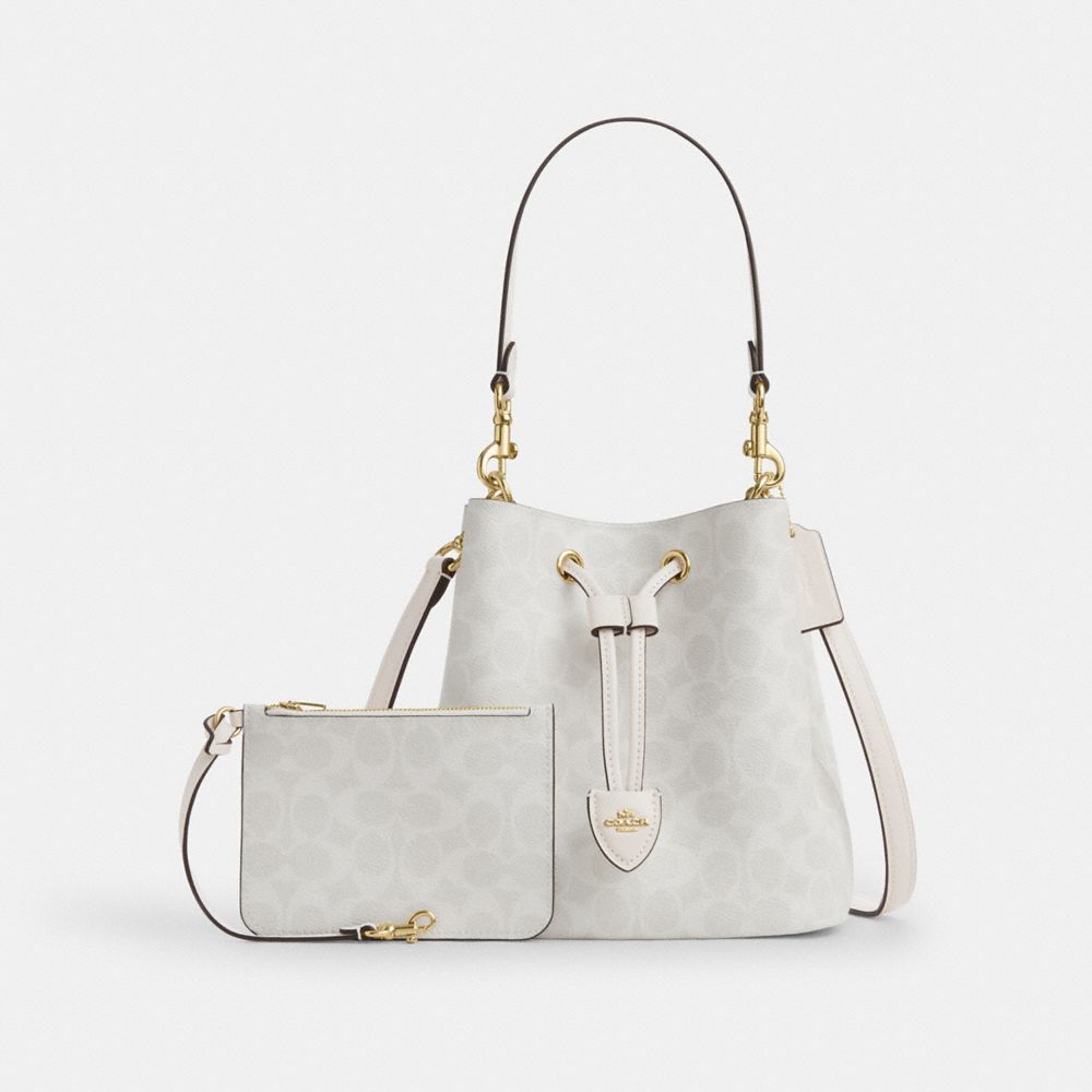 Rowan Bucket Bag In Signature Canvas