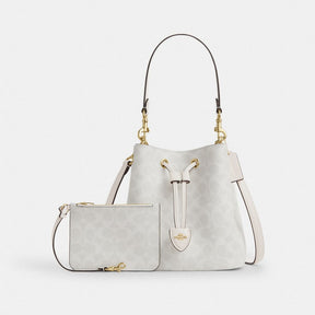 Rowan Bucket Bag In Signature Canvas