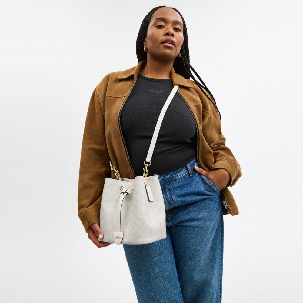 Rowan Bucket Bag In Signature Canvas