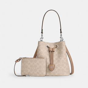 Rowan Bucket Bag In Signature Canvas