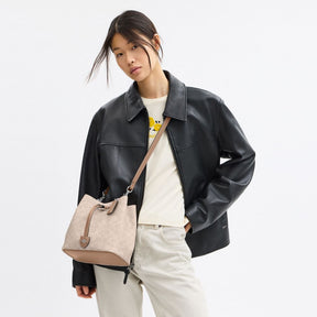 Rowan Bucket Bag In Signature Canvas