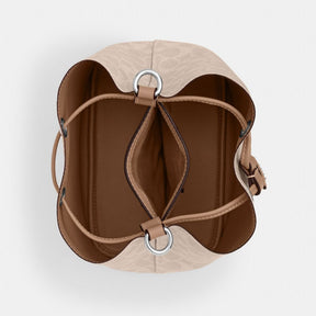 Rowan Bucket Bag In Signature Canvas