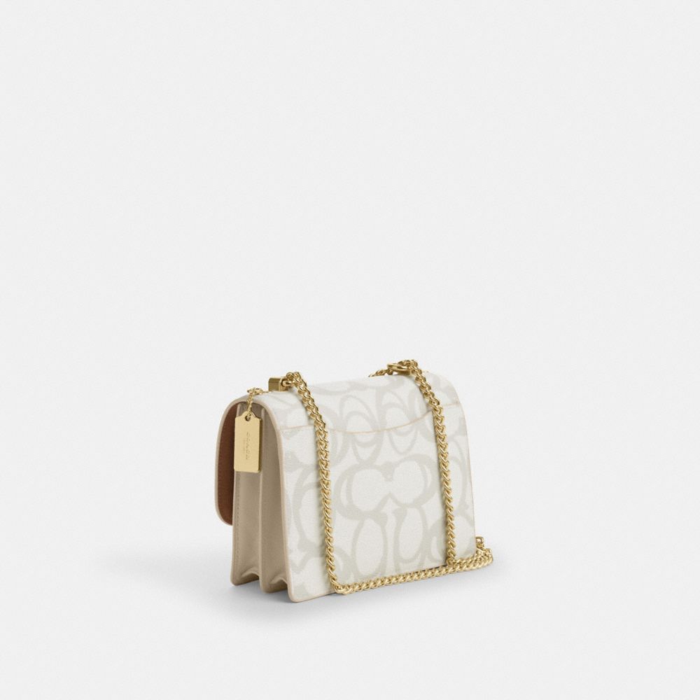 Klare Crossbody Bag In Sketch Signature Canvas