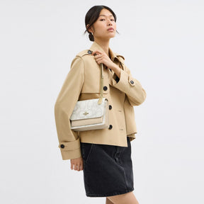 Klare Crossbody Bag In Sketch Signature Canvas