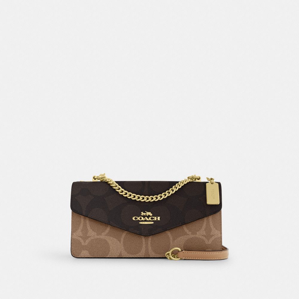Klare Envelope Crossbody Bag In Blocked Signature Canvas