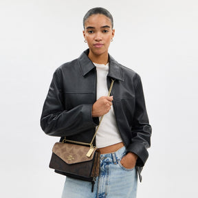 Klare Envelope Crossbody Bag In Blocked Signature Canvas