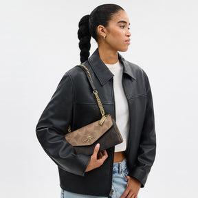 Klare Envelope Crossbody Bag In Blocked Signature Canvas