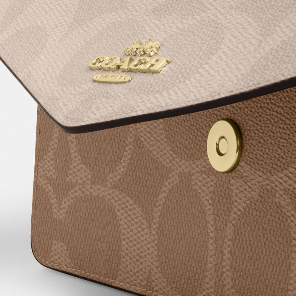 Klare Envelope Crossbody Bag In Blocked Signature Canvas