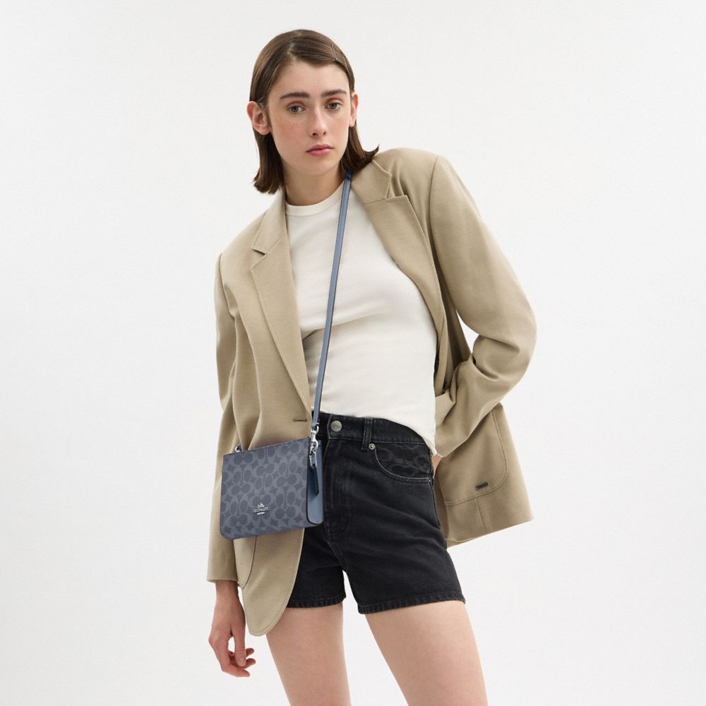 Slim Crossbody Bag In Signature Canvas