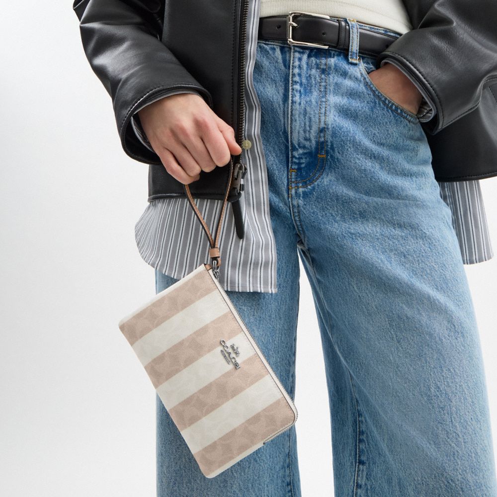 Large Corner Zip Wristlet In Signature Canvas