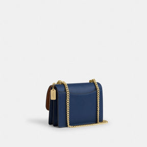 Mini Klare Crossbody Bag In Signature Canvas