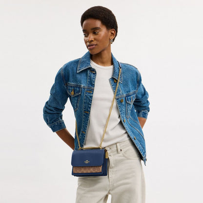 Mini Klare Crossbody Bag In Signature Canvas