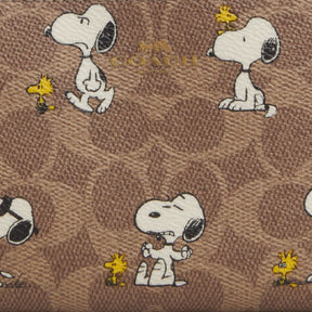 Coach X Peanuts Corner Zip Wristlet In Signature Canvas With Snoopy Print