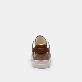 Coach X Peanuts High Line Sneaker In Signature Canvas With Snoopy Print