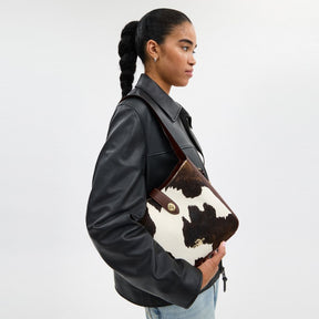Hadley Convertible Crossbody Bag With Cow Print And Tassel