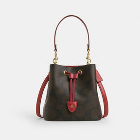 Rowan Bucket Bag In Maxi Signature Canvas